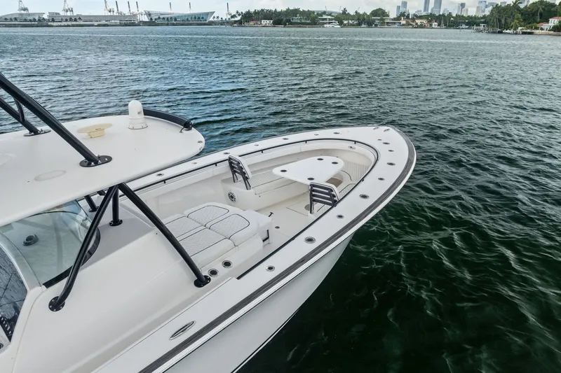 Slide: The Image of 2022 Valhalla V-41 boat on water, featuring sleek design and spacious deck. - 10