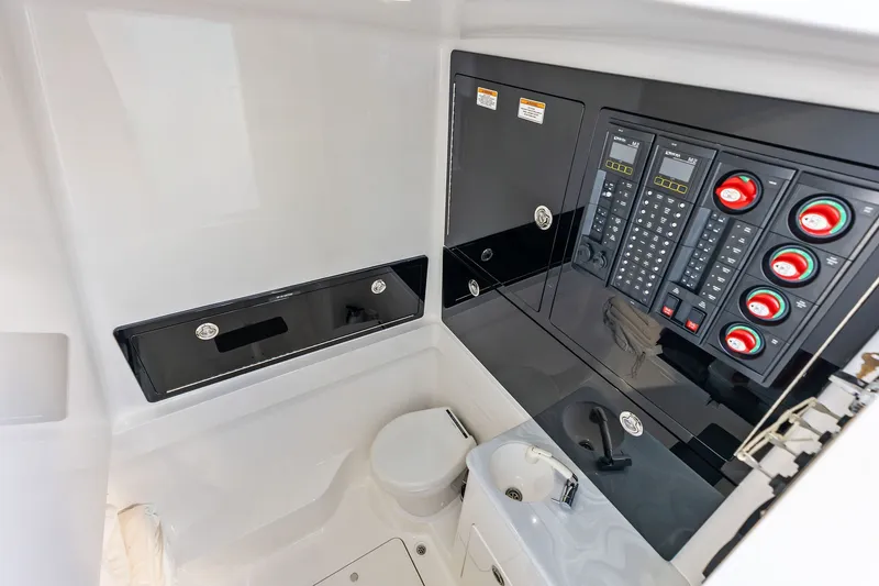 Slide: The Image of 2022 Valhalla V-41 interior control panel and compact bathroom setup. - 70