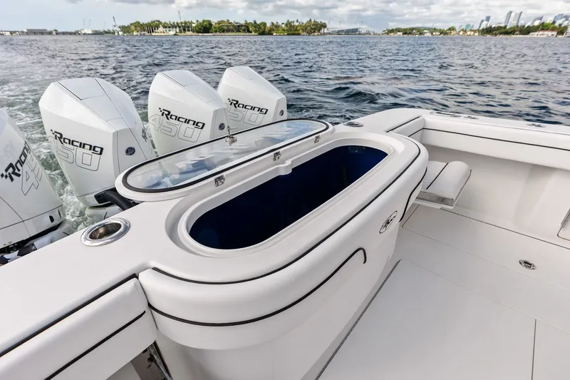 Slide: The Image of 2022 Valhalla V-41 boat with four Racing 450 engines on open water. - 24