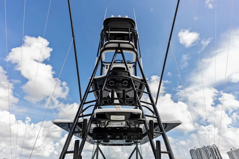 Slide: The Image of 2022 Valhalla V-41 boat tower against a blue sky with clouds. - 56