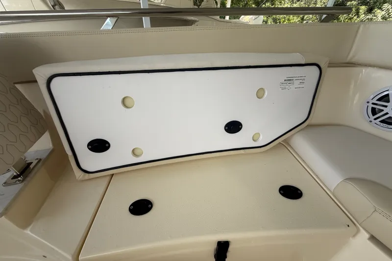 Slide: The Image of Interior view of a 2027 Scout 240 XSF boat, featuring seating and storage compartments. - 3