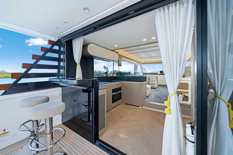 Slide: The Image of Interior of the 2024 Azimut Magellano with modern kitchen and stylish design. - 18