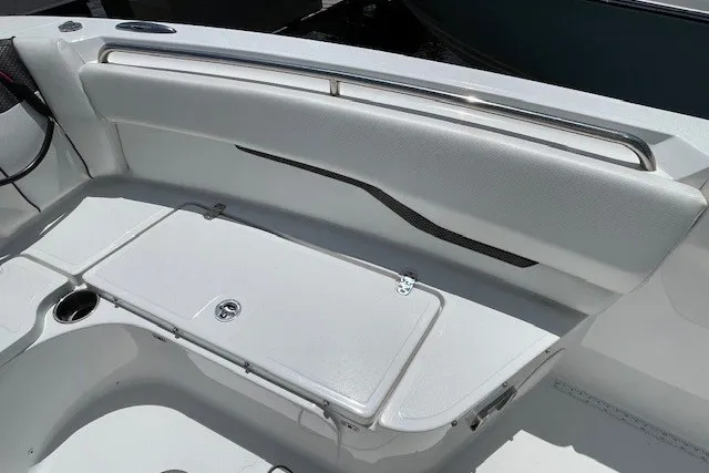 Slide: The Image of 2023 Wellcraft 242 Fisherman boat interior with sleek seating and storage compartment. - 68