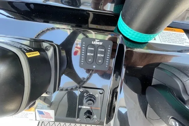 Slide: The Image of Control panel of 2023 Wellcraft 242 Fisherman boat with Lenco and Yamaha components. - 49