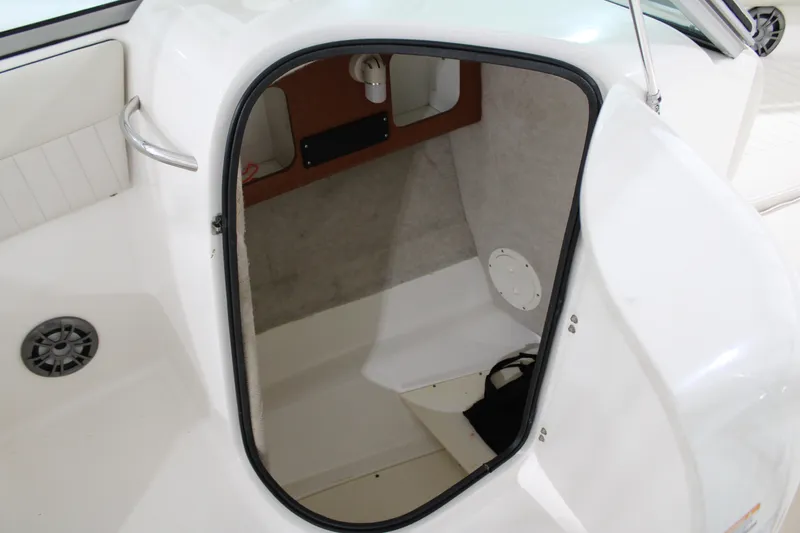 Slide: The Image of 2005 Robalo R227 Dual Console boat interior storage compartment. - 20