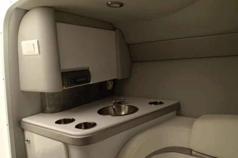 Slide: The Image of Interior of 2006 Formula 292 FASTech boat with compact kitchenette and sink. - 13