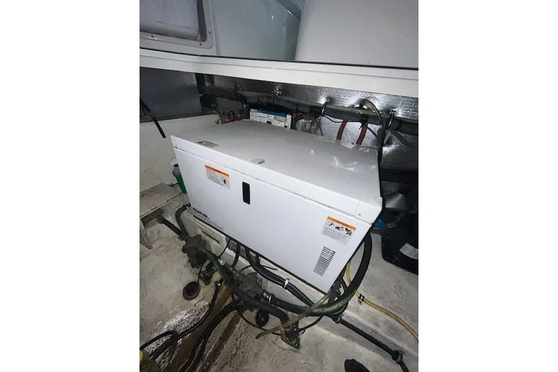 Slide: The Image of Engine compartment of 2007 Chaparral Signature 280 boat with generator and wiring. - 20