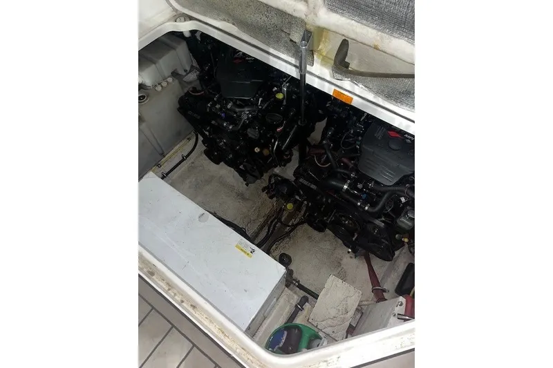 Slide: The Image of Engine compartment of a 2007 Chaparral Signature 280 boat, showing dual engines. - 19