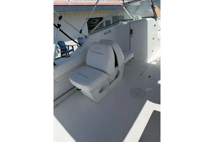 Slide: The Image of 2008 Sea Pro 228 Dual Console boat interior with seating and console view. - 37