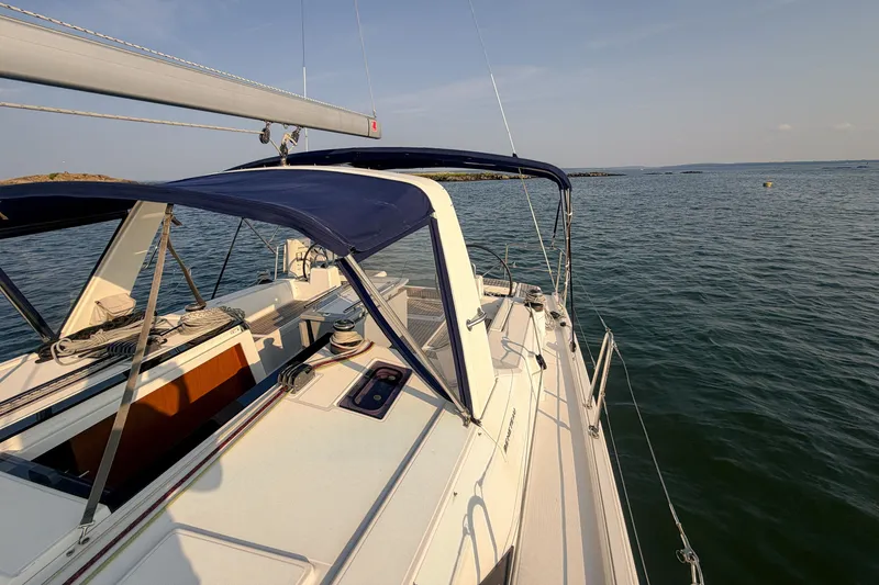 Slide: The Image of Beneteau Oceanis 41.1 sailboat, 2021 model, cruising on calm waters. - 11