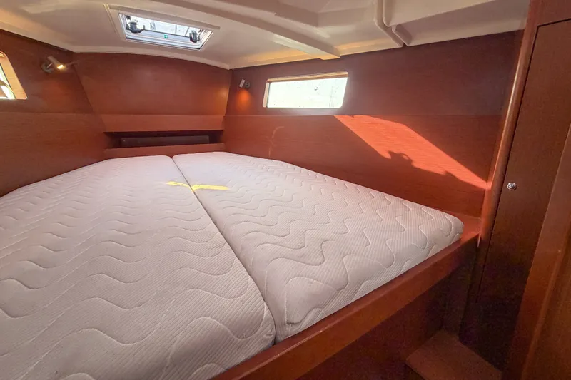 Slide: The Image of Interior cabin of 2021 Beneteau Oceanis 41.1 yacht with comfortable bedding. - 43