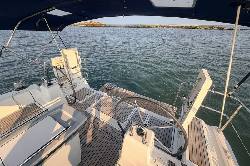 Slide: The Image of Cockpit view of 2021 Beneteau Oceanis 41.1 sailboat with dual steering wheels. - 19