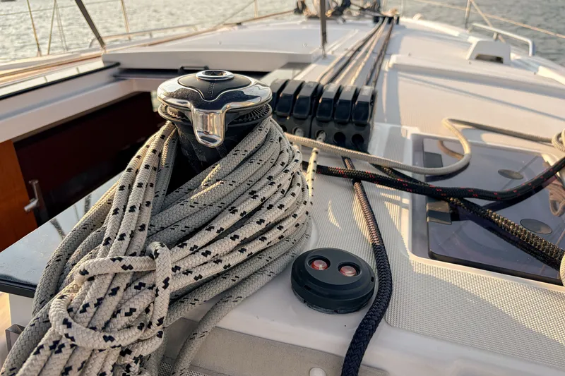 Slide: The Image of Deck of 2021 Beneteau Oceanis 41.1 sailboat with ropes and winch. - 25