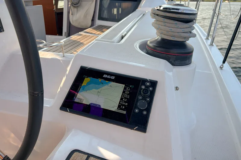 Slide: The Image of Cockpit of 2021 Beneteau Oceanis 41.1 with navigation display and winch. - 26