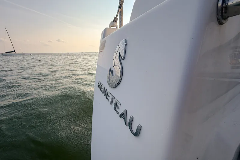 Slide: The Image of Beneteau Oceanis 41.1 sailboat on water, 2021 model, close-up of logo. - 30