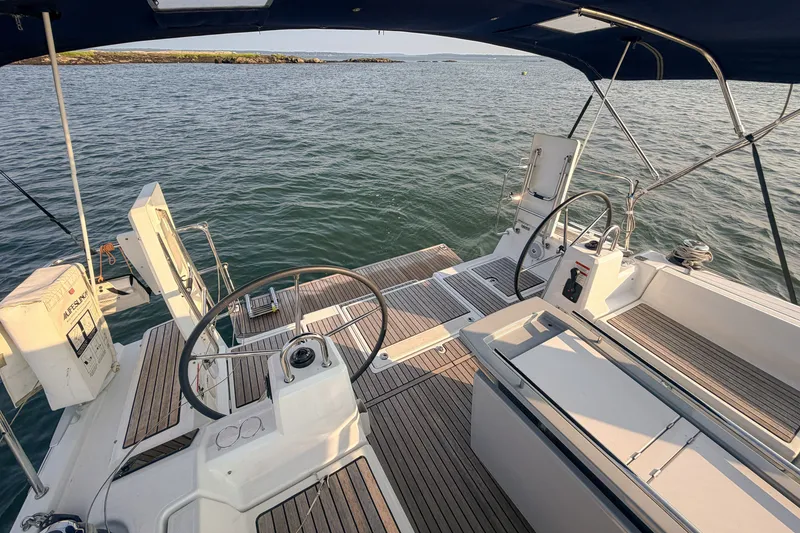 Slide: The Image of Cockpit view of 2021 Beneteau Oceanis 41.1 sailboat with dual steering wheels. - 20