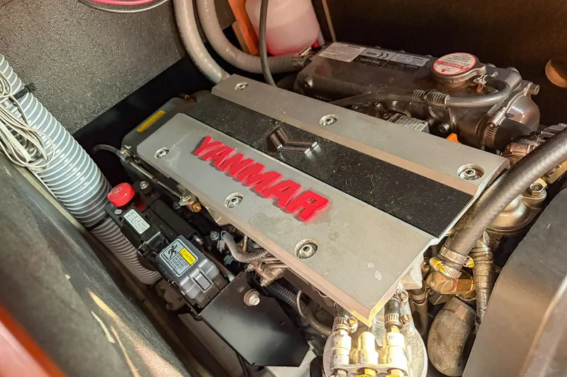 Slide: The Image of Yanmar engine in a 2021 Beneteau Oceanis 41.1 sailboat, showcasing detailed components. - 54