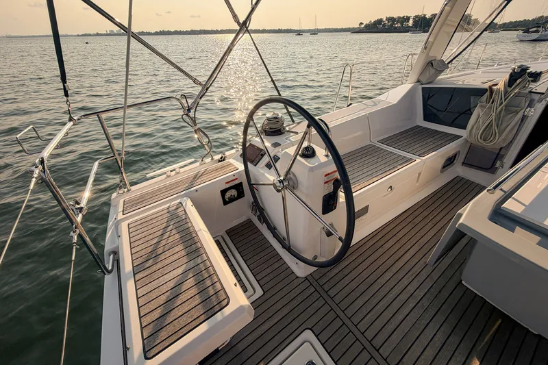 Slide: The Image of Cockpit of 2021 Beneteau Oceanis 41.1 sailboat with scenic water view. - 14