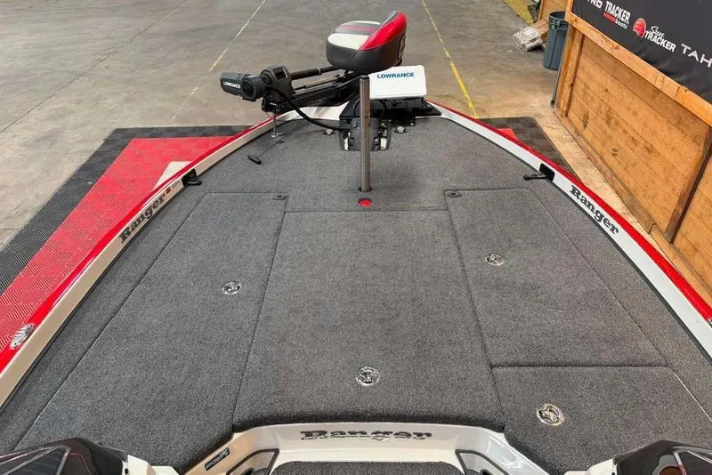 Slide: The Image of 2022 Ranger Z520R boat deck with Lowrance equipment in a showroom setting. - 9