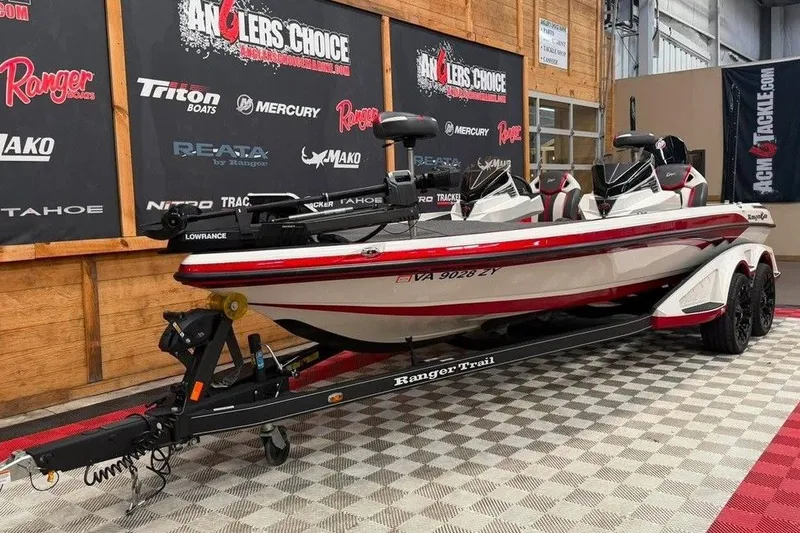 Slide: The Image of 2022 Ranger Z520R boat on trailer in showroom with branded backdrop. - 3