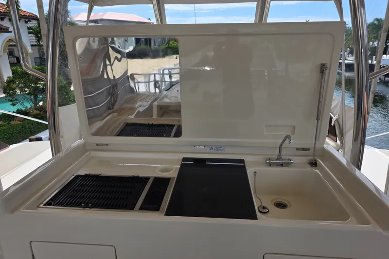 Slide: The Image of Outdoor kitchen on 2016 Aquila 48 yacht with sink and grill. - 7