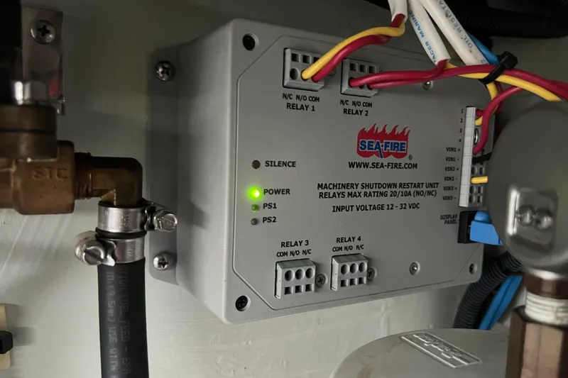 Slide: The Image of Sea-Fire machinery shutdown unit in 2016 Aquila 48, with active power indicator. - 36