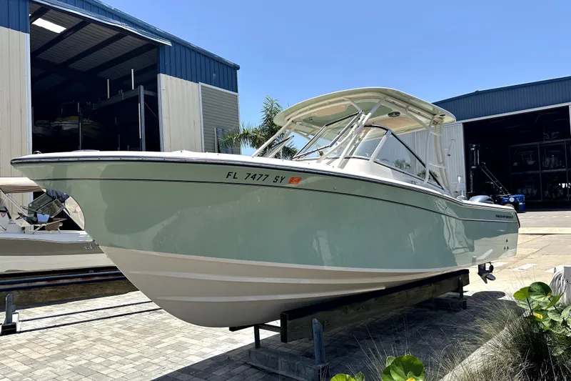 The Image of 2021 Grady-White Freedom 275 boat on display outside a storage facility. - 0