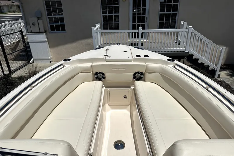Slide: The Image of 2021 Grady-White Freedom 275 boat interior with spacious seating and sleek design. - 14
