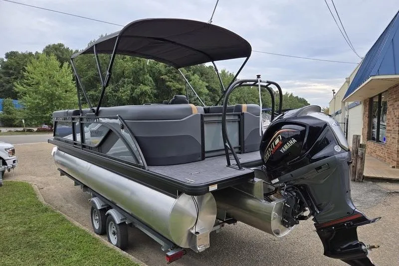 Slide: The Image of 2026 Godfrey Sweetwater 2286 SB pontoon boat with Yamaha outboard motor on trailer. - 11