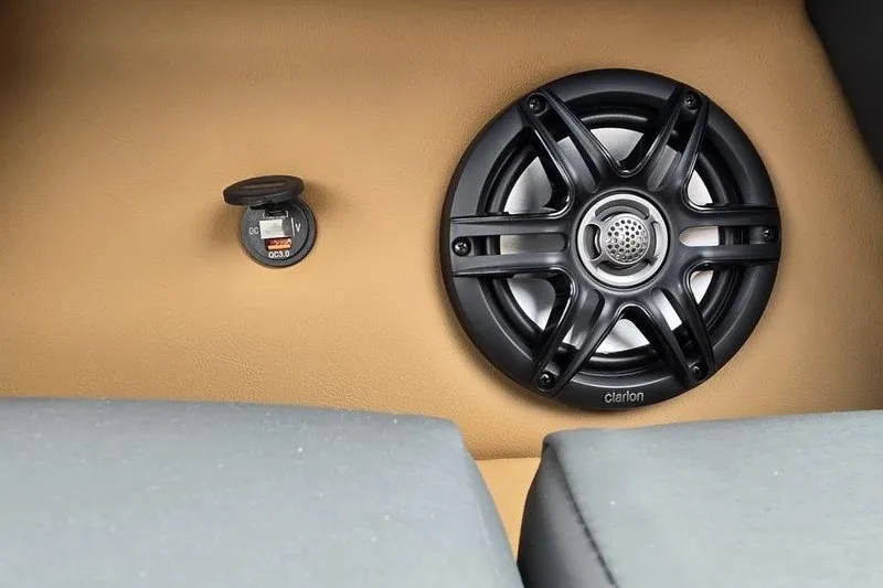 Slide: The Image of Speaker and USB port in 2026 Godfrey Sweetwater 2286 SB boat interior. - 2