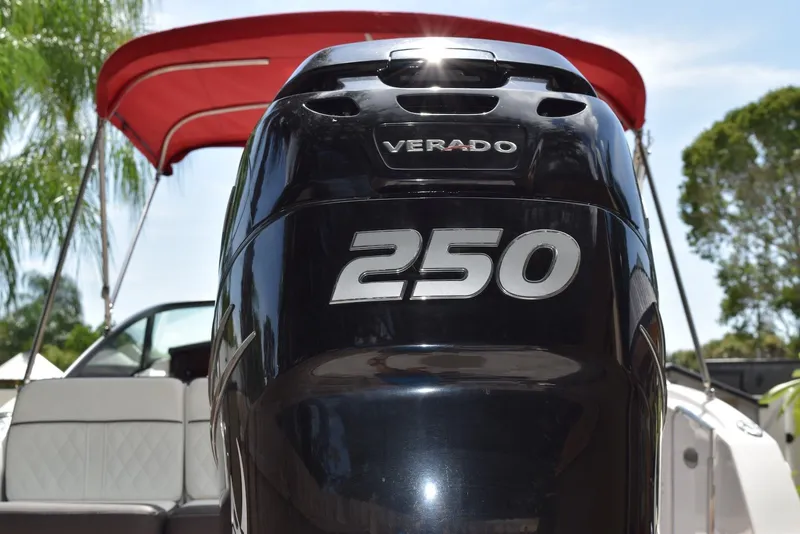 Slide: The Image of 2018 Monterey M-45 boat with Verado 250 engine, red canopy, and white seating. - 4