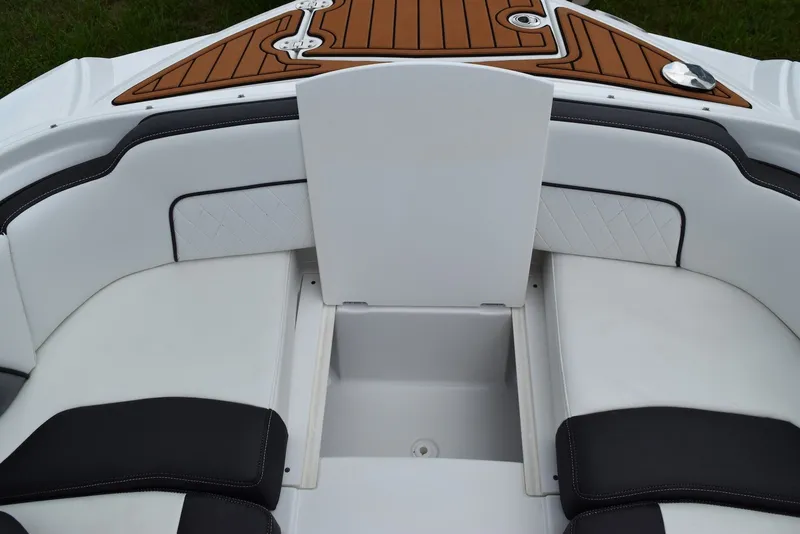 Slide: The Image of 2018 Monterey M-45 boat interior with white and black seating and teak accents. - 8