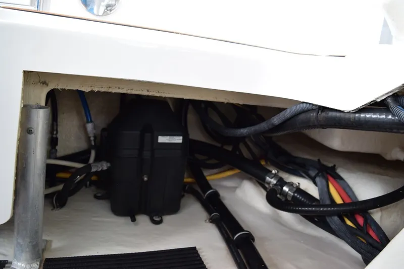 Slide: The Image of Engine compartment of a 2018 Monterey M-45 boat, showing cables and components. - 35