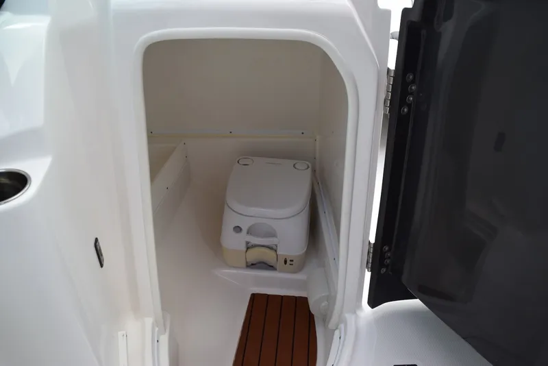 Slide: The Image of Compact marine toilet in 2018 Monterey M-45 boat cabin with wooden flooring. - 29