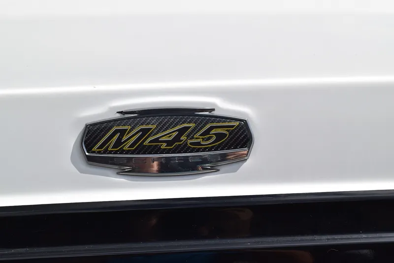 Slide: The Image of 2018 Monterey M-45 emblem on a white surface, showcasing sleek design. - 37