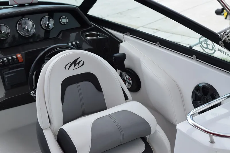 Slide: The Image of Interior of a 2018 Monterey M-45 boat featuring a sleek dashboard and comfortable seating. - 15
