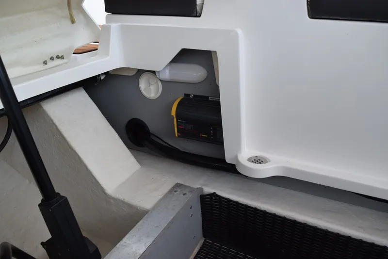 Slide: The Image of Interior view of a 2018 Monterey M-45 boat compartment with equipment and wiring. - 33