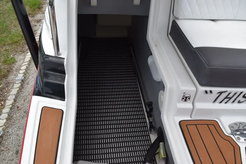 Slide: The Image of Interior view of a 2018 Monterey M-45 boat with seating and flooring details. - 20