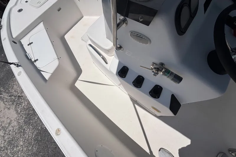 Slide: The Image of Interior view of a 2001 Century 1900 Inshore boat, showcasing controls and seating area. - 20