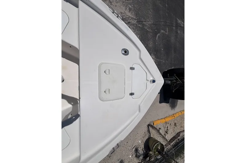 Slide: The Image of Bow view of a 2001 Century 1900 Inshore boat on a trailer. - 23