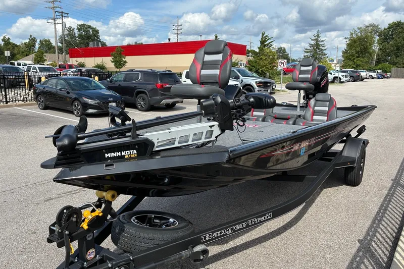 Slide: The Image of 2023 Ranger RT188 fishing boat with Minn Kota Ultrex motor in a parking lot. - 10