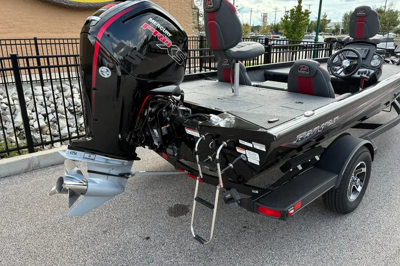 Slide: The Image of 2023 Ranger RT188 boat with Mercury Pro XS engine, parked on a trailer. - 6