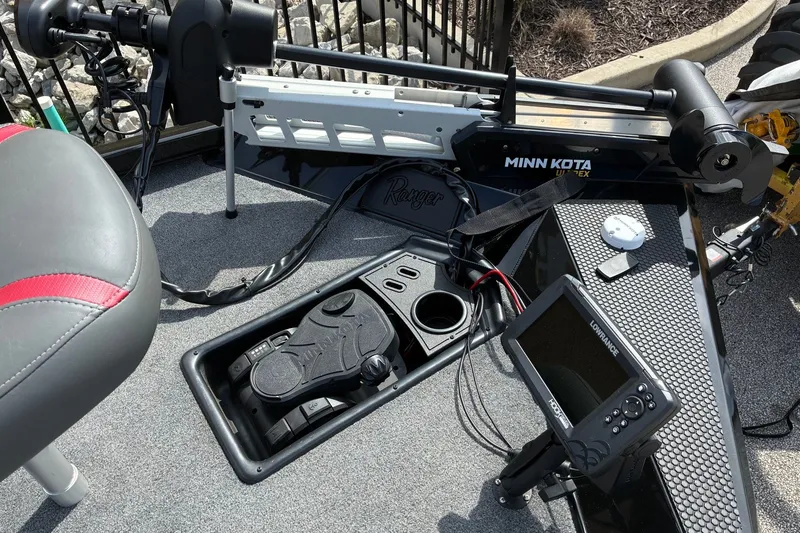 Slide: The Image of 2023 Ranger RT188 boat deck with Minn Kota trolling motor and Lowrance fish finder. - 14