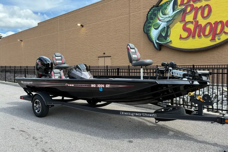 Slide: The Image of 2023 Ranger RT188 boat parked outside Bass Pro Shops. - 7