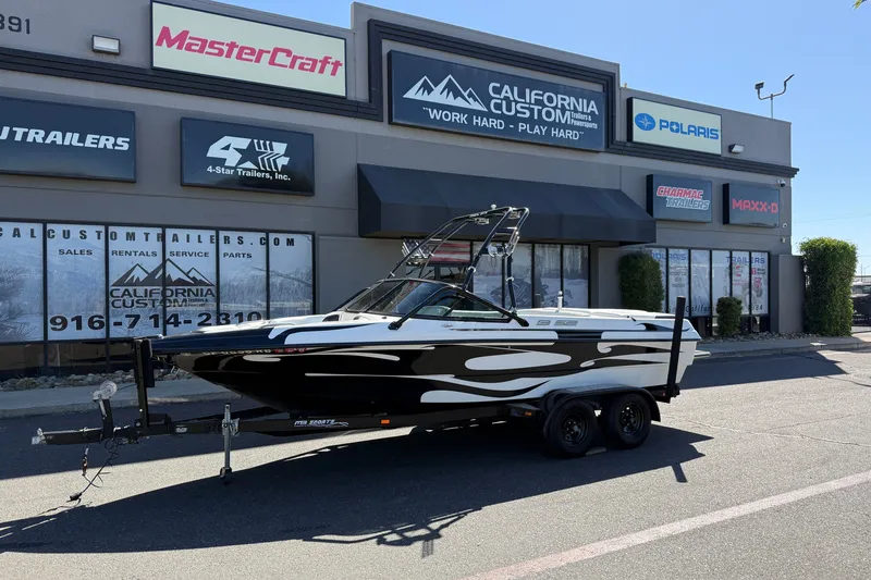 The Image of 2004 MB B-52 boat on trailer outside California Custom Trailers store. - 1