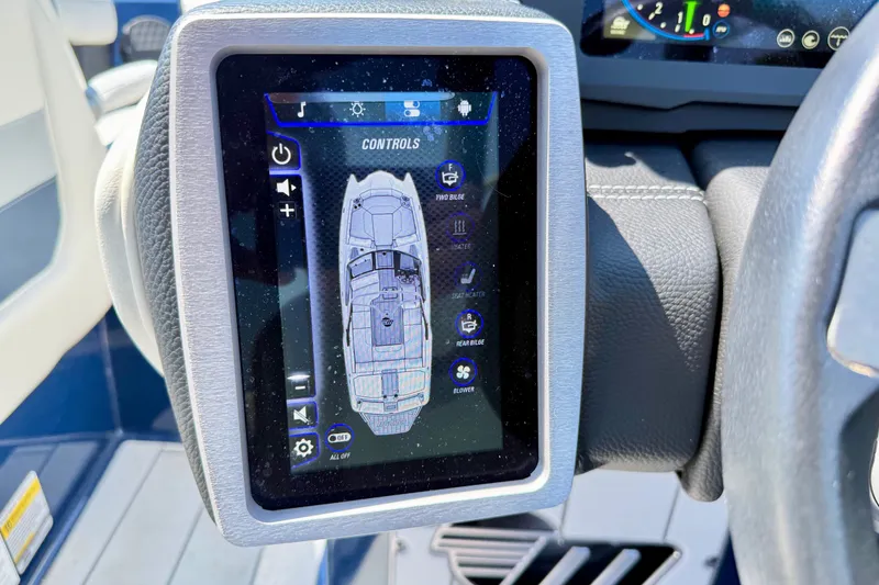 Slide: The Image of Touchscreen control panel in 2022 Malibu Wakesetter 23 MXZ boat cockpit. - 15