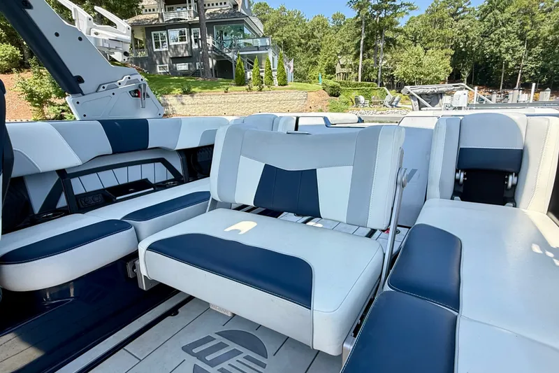 Slide: The Image of Interior of 2022 Malibu Wakesetter 23 MXZ boat with luxurious seating. - 27