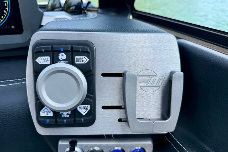 Slide: The Image of Control panel of 2022 Malibu Wakesetter 23 MXZ boat with surf and wedge settings. - 18