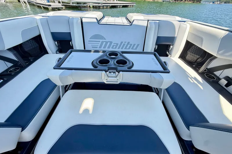 Slide: The Image of Interior of 2022 Malibu Wakesetter 23 MXZ boat with seating and cup holders. - 28