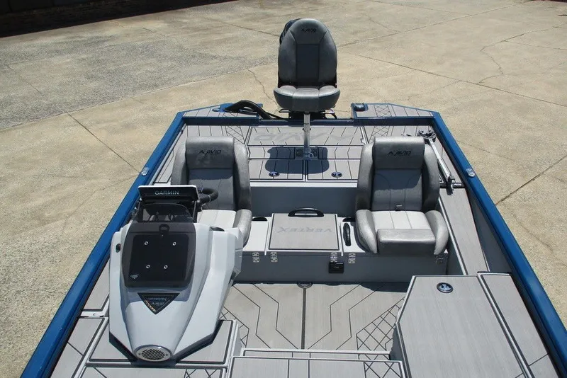 Slide: The Image of 2026 Avid 18 Vertex boat interior with modern seating and control panel. - 5